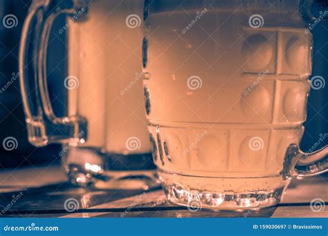 Close Up Two Cold Beers With Foam And Drops Stock Image Image Of
