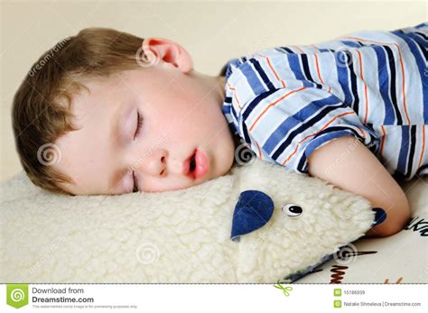 Boy sleeping stock image. Image of pajamas, caucasian - 15186939