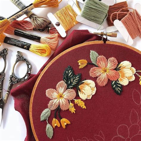 Beautifull flowers embroidery on a wine red fabric | Flower embroidery ...