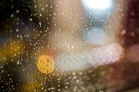 Full Frame Shot Of Raindrops On Glass Window · Free Stock Photo