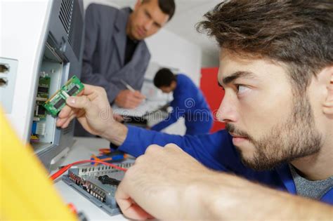 Male Checking Electronic Devices At Workshop Stock Image Image Of