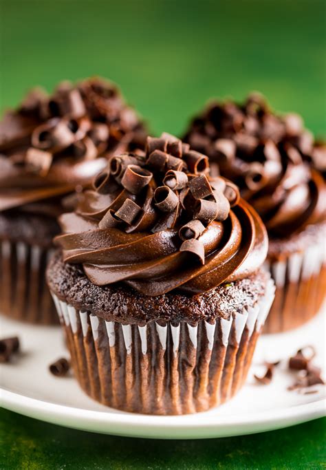 Chocolate cupcakes with strawberry frosting. The Best Zucchini Chocolate Cupcakes with Chocolate Frosting