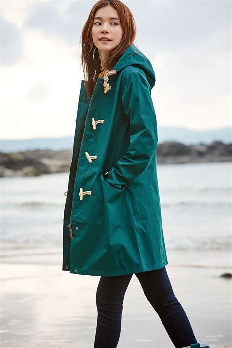 seasalt mid thigh length ladies windproof and breathable waterproof coat with zip toggle and