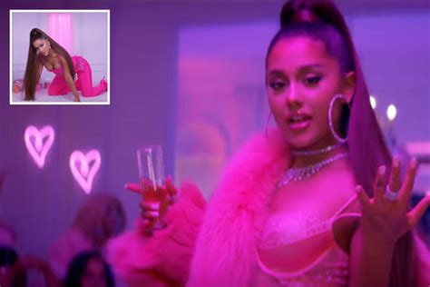 Ariana Grande Strips To A Pink Bra For Steamy 7 Rings Video