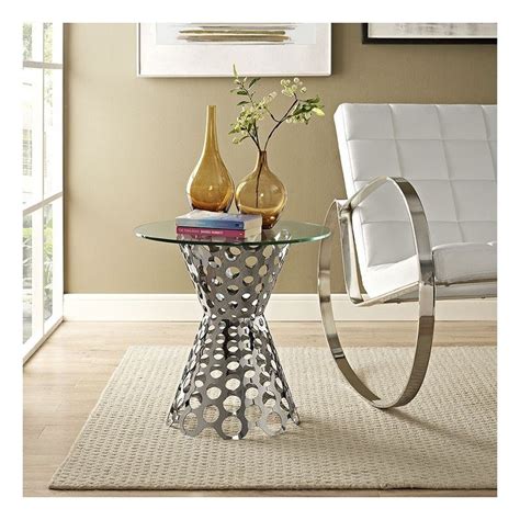 The sleek aesthetic of tables like these lend instant cool to your living room decor. Modern Round Glass Side Table Margo