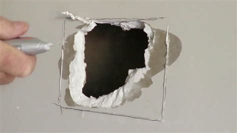 Apply a first coat of joint compound (like spackle) with a putty knife over the mesh. 🏠 How to Repair Drywall and Fix a large Hole in the Plaster Wall the easy way - YouTube