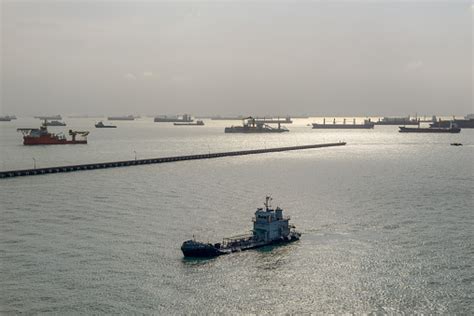 Landscape View Of Cargo Ships Entering One Of The Busiest Ports In The