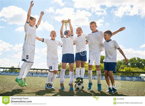 Junior Football Team Celebrating Victory Stock Photo Image Of Group