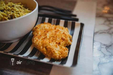 To make these air fryer breaded chicken breasts, you start with a classic dredge in flour and then you dip the chicken in a whisked egg to make sure the breading sticks. Air Fryer Garlic Panko Chicken Breast | AirFrying.net