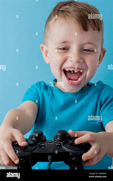 Little Kid Boy 2 3 Years Old Wearing Blue Clothes Hold In Hand Joystick