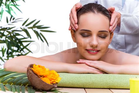 Woman During Massage Session In Spa Salon Stock Image Colourbox