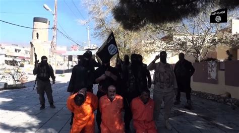 islamic state behead three kurdish soldiers dressed in orange in new video