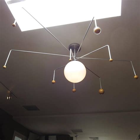 Lighting is one of the most important of all building systems, and we offer buyers thousands products of the range of lights manufacturers,wholesalers we represented is extensive. Mid-Century Solar System Ceiling Lamp at 1stdibs