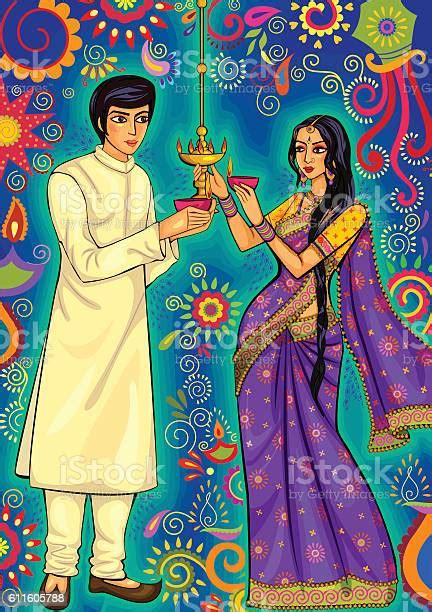 Indian Couple With Diya Decoration For Diwali Festival Celebration In