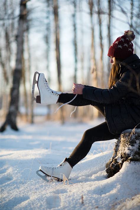 Teenage Girl Laces Her Ice Skates By Tara Romasanta Photography Stocksy United Skate Aesthetic