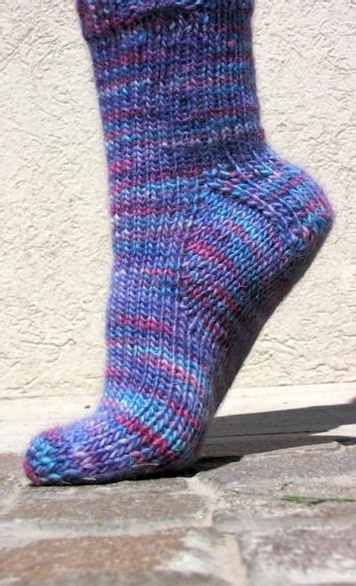 Shown in colors #1317, #7135, & #9623. Worsted Weight Sock Pattern - Toe-Up/Top-Down | KnitFreedom