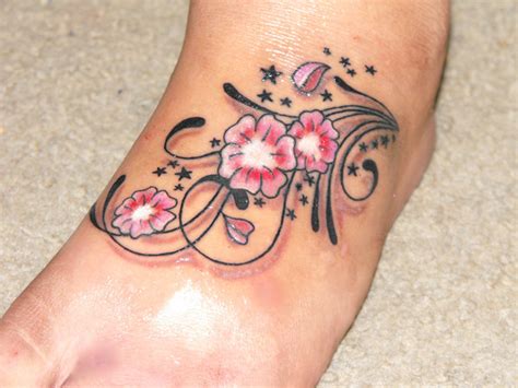 Fantastic Flowers Tattoo On Foot