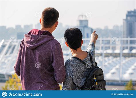 Two Young People Tourists Exploring New City Together Girl With