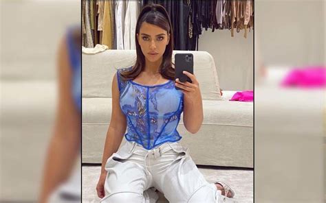 Kim Kardashian Looks Too Hot To Handle As She Flaunts Her Sensuous Hourglass Curves In Latest