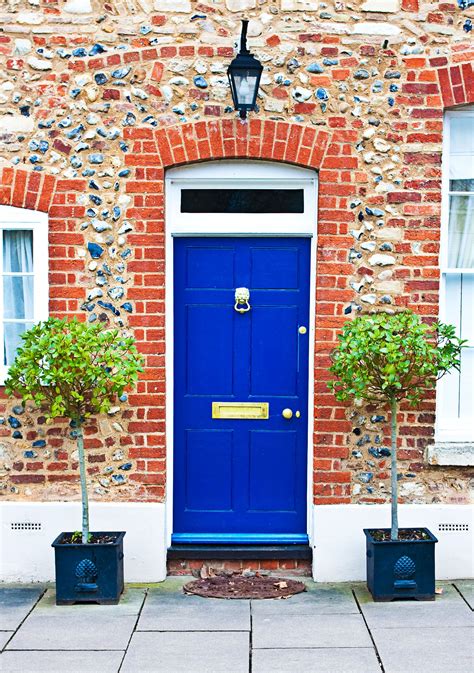 4 Ways To Style A Colorful Front Door Bright Front Doors Painted