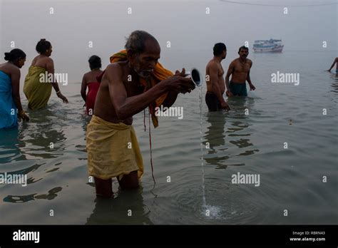 Pilgrims Take Holy Bath At Gangasagar Fair Stock Photo Alamy