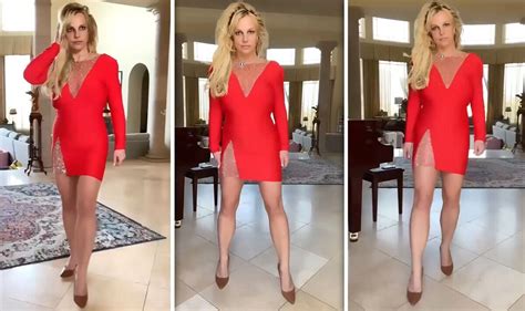 britney spears 40 risks revealing too much as she goes underwear free in tiny red dress