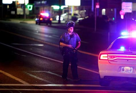 officials say shooting of ferguson police officer is not linked to protests the new york times