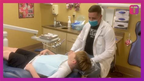 military dad surprises son in dentist chair youtube