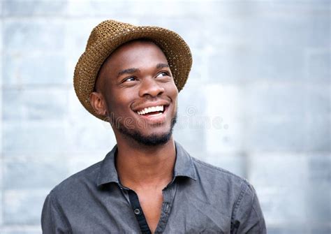 Close Up Portrait Of A Happy Young African American Man Laughing Stock