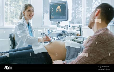 In The Hospital Pregnant Woman Getting Ultrasound Sonogram Scan Obstetrician Explains
