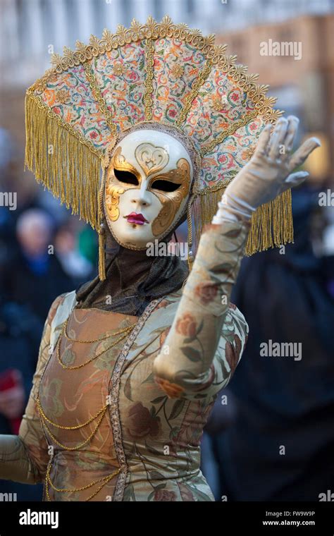 Golden Mask At The Venice Carnival In Saint Marks Square Venice