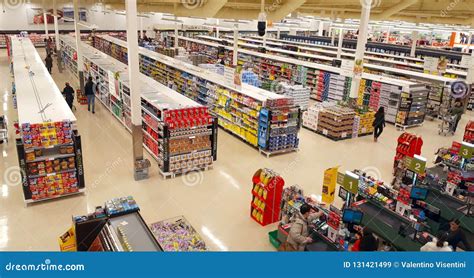 Supermarket Aisles And Shelves On Blurred Background Editorial Photo