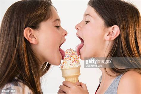Biting Into Ice Cream Cone Photos And Premium High Res Pictures Getty