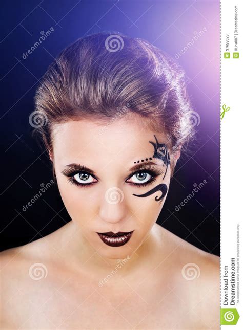 Beautiful Girl With A Tattoo On His Face Stock Image