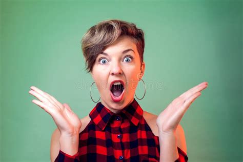 People And Emotions Surprised Young Woman With Short Hair Stock Image