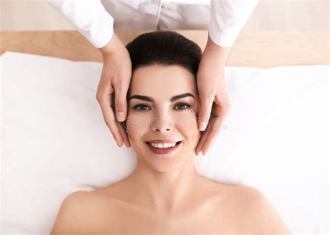 Young Woman Enjoying Facial Massage In Spa Salon Stock Image Image Of Professional Health