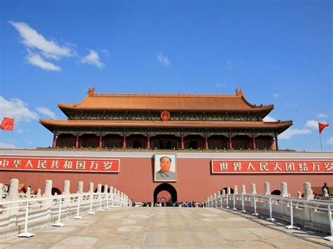 In the square stand tiananmen tower, monument to the people's heroes. Tiananmen Square A Large Square in Beijing, China | Travel ...