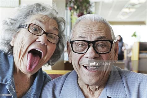 Grandpa And Grandma Making Faces High Res Stock Photo Getty Images