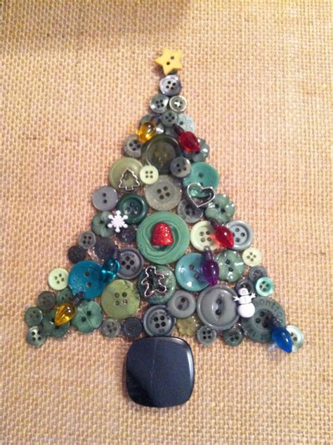 A Small Christmas Tree Made Out Of Buttons