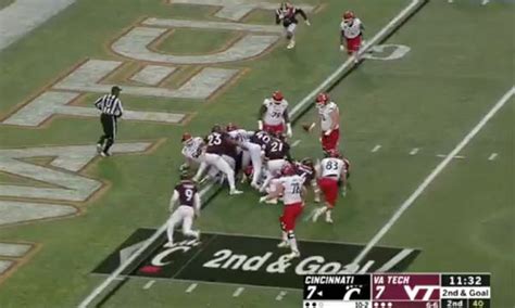 Watch: Cincinnati scores wild TD after goal line fumble ...