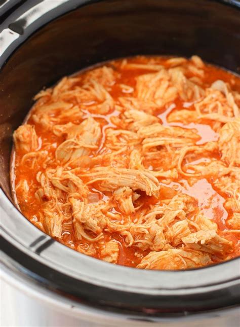 Spray, butter, or oil your crockpot insert. This slow cooker buffalo chicken is juicy, spicy, and ...