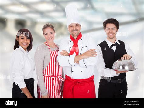 Group Of Happy Restaurant Chef And Waiters Standing Together Stock