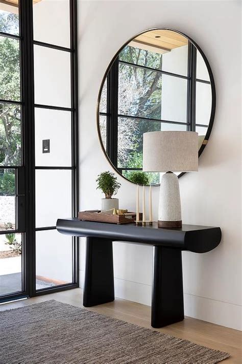 Black Console Table With Extra Large Round Brass Mirror Modern