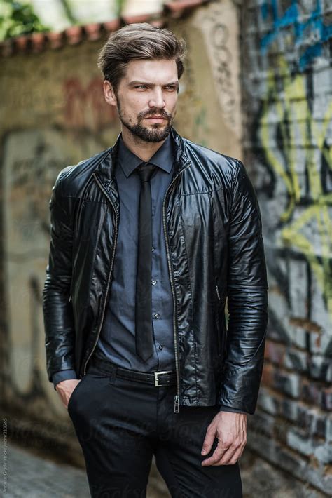 Handsome Man Wearing Leather Jacket And Tie Del Colaborador De Stocksy Andreas Gradin Stocksy