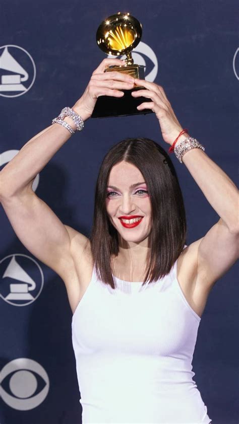 Madonna Poses With One Of Her Four Grammy Awards At The St Annual Grammy Awards In Los Angeles