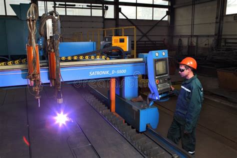 Metalwork Plant Worker Controls System Thermal Cutting Of Metal