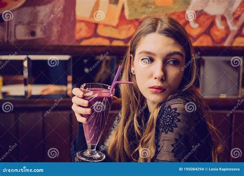 Beautiful Young Woman With Fruit Smoothie Girl Drinking Smoothie In A Cafe Girl In Black Dress