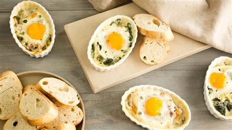 Put 1 tablespoon of the reduced heavy cream on top of the egg in each ramekin. An easy recipe for baked eggs transforms breakfast or ...