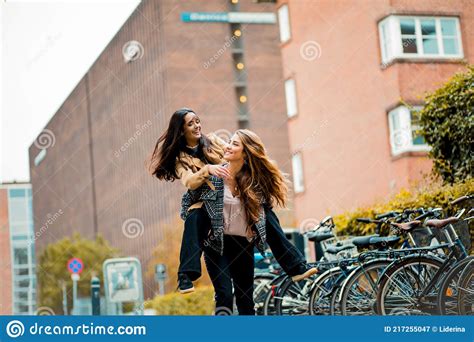 Two Women Having Fun Outside Stock Image Image Of Ethnic City