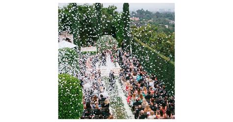 As You Share Your First Kiss As A Married Couple Shower Your Guests Over The Top Wedding